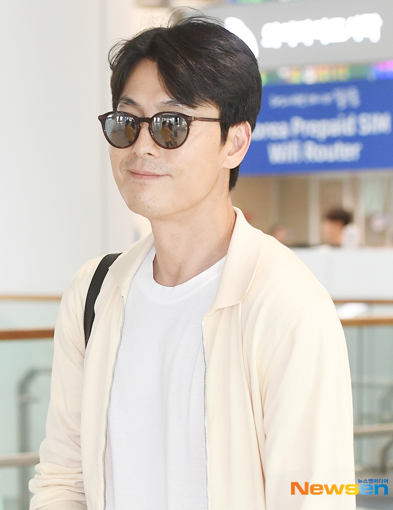 Actor Jung Woo-sung is performing Entrance through Incheon International Airport in Unseo-dong, Jung-gu, Incheon after finishing his overseas schedule on the afternoon of August 27th.useful stock