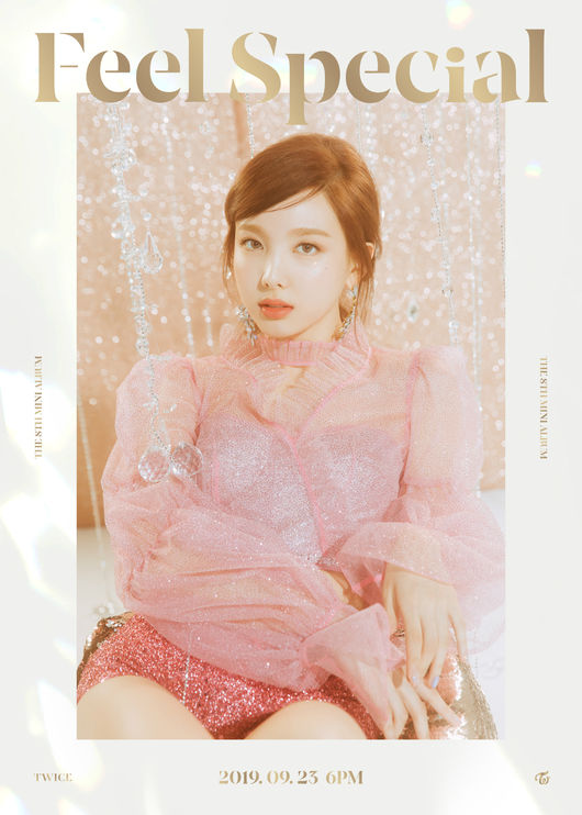 TWICE members Nayeon, Jingyeon, MOMOs mysterious beauty of the comeback photo was released.Group TWICE will release its title song with its mini-8 album Feel Special (Phil Special) at 6 p.m. on the 23rd and make a surprise comeback.Earlier, JYP Entertainment (hereinafter referred to as JYP) released teaser videos of Nayeon, Jingyeon and MOMO through the official SNS channel of TWICE, and released three images of three members at noon on the 11th, raising expectations for a comeback.Those represented by TWICEs sister line have emanated a brilliant charm in each teaser image.If the teaser video showed the queens atmosphere with elegant dress and colorful accessories, the image that opened today boasted a goddess-like beauty with a smile and a faint feeling.TWICE is expected to launch a non-stop popular march with a more ripe charm through a new song to be released on the 23rd.On the other hand, TWICE has been well received for its musical change with FANCY (Fancy), which was released in April, and it has been fresh with songs and choreography emphasizing bold and sweet moods.Feel Special, a new song that will be released in about five months after FANCY, has selected a different message as a theme and added lyricism.It is expected to show intense elegance in music, performance, and concept.Moreover, this song was written and composed by J. Y. Park, the head of JYP, and Lee Woo-min (collapedone), who made TWICE KNOCK KNOCK (Nak Nak), arranged the song and prepared for the 12 consecutive hits.TWICE has been loved by a total of 11 songs, from its debut song OOH-AHH Hah (elegantly) to its previous work FANCY, which has set a record of exceeding 100 million views on the music charts and YouTube MVs.The music industry Midas Son J. Y. Park and One Top Girl Group TWICE meet to meet, SIGNAL (signal), What is Love? (What Is Love?)), and it is noteworthy what color music will be shown.TWICEs Mini 8 Feel Special will be released on various music sites at 6 pm on the 23rd.JYP Entertainment