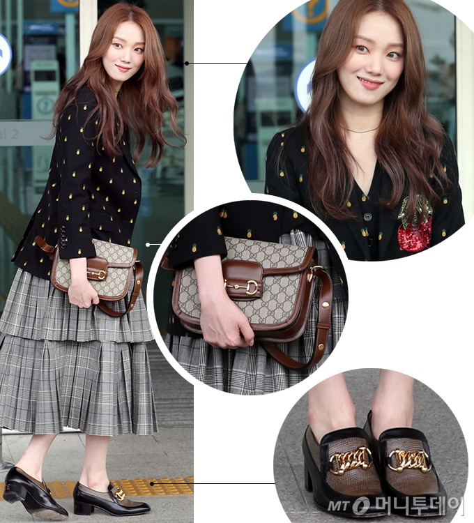 Actor Lee Sung-kyung presented a unique pattern match styling.Lee Sung-kyung left for Milan, Italy, on the afternoon of the 20th, at Incheon International Airport.Lee Sung-kyung made a unique airport fashion by mixing colorful pattern items.Lee Sung-kyung matched the classic check-plitz skirt with a pineapple embroidery pattern, a sequin patch with a stylish vest and jacket, and wore a cool loafer with color schemes and metal decorations.Here Lee Sung-kyung added a point by lifting a crossback with a vintage pattern and leather trimming like a clutch.The costume worn by Lee Sung-kyung on this day is the 2019 pre-pol collection product of fashion brand Gucci.Model in the lookbook matched embroidery Jacket and best, check long skirt, ankle-covering black boots and a luxurious polished red chain bag.Model used its unconventional accessories to complete its bold look.He added an intense point by matching a thick pearl necklace, yellow tinted sunglasses and a blue beret with a Gucci logo.Lee Sung-kyung, The Classic and gracefully...Model, bold styling