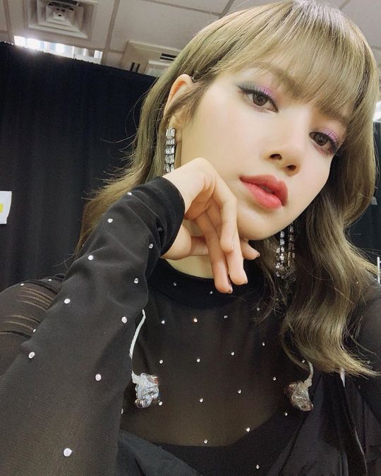 Group BLACKPINK member Lisa boasted outstanding beautiful looks and fan love.Lisa wrote on her Instagram on September 22, Blink (BLACKPINK official fandom name)! It was so nice to be able to spend such precious times together!Thank you for being with us all the time. You know? We should not have Blink. Inside the photo was a picture of Lisa in a see-through black costume, with her dreamy eyes staring at the camera.Lisas blemishesless white-oak skin and exotic features catch her eye.The fans who responded to the photos responded such as real queen, We should not have Lisa and It is so beautiful.delay stock