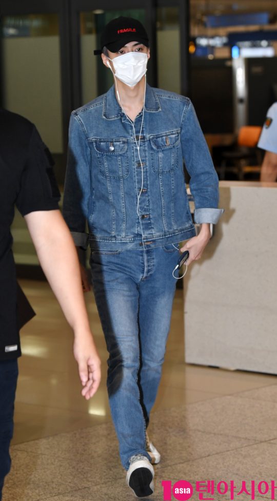 Sehun of group EXO is showing airport fashion by entering Incheon International Airport after finishing the concert held in Bangkok, Thailand on 24th Days morning.