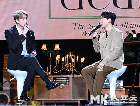 EXO Sehun reveals he wants Chens music video protagonistOn the afternoon of the 1st, EXO Chens second mini-album, To Love You, was held at YES24 Live Hall in Seoul Gwangjin-gu. Sehun appeared as a music concert MC.Earlier, the Music Video was released, and Chen said, The typhoon was forecast on the day of the Music Video shooting. It was outdoor shooting, but I was worried it would rain.Fortunately, the rain did not come and it ended smoothly. Sehun, who was listening to this, said, If you are in the form of a dramatize, please write me as the main character, I will do it free of charge.Chen said, I know Sehun is perfect, and I will ask you to care for it.