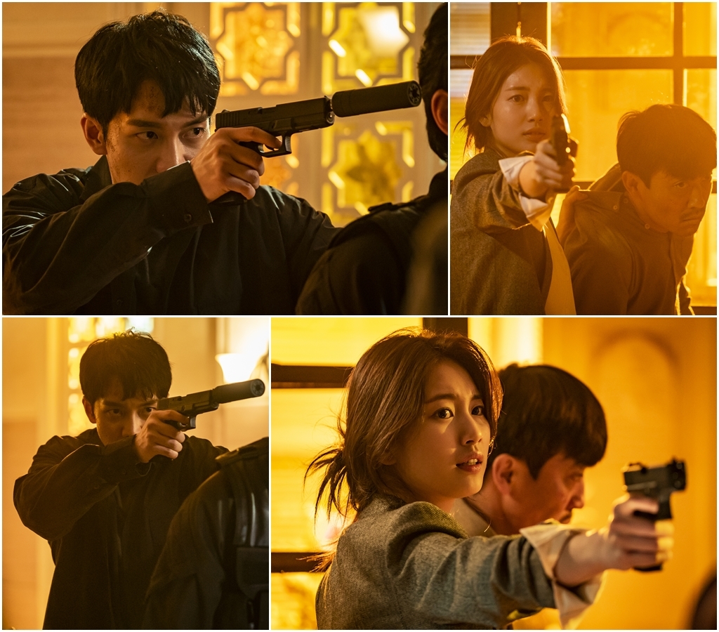 Seoul = = Vagabond Lee Seung-gi and Bae Suzy again show off their two shots of Shooting Action, which are surrounded by the shadow of deep death.The SBS gilt drama Vagabond (playplay by Jang Young-chul, Jung Kyung-soon/directed by Yoo In-sik), which airs at 10 p.m. on the 18th, is an intelligence action melody that uncovers a huge national corruption hidden in a concealed truth by a man involved in a civil-port passenger plane crash.Lee Seung-gi and Bae Suzy struggle together, struggling to find out the truth behind the accident and to find out the hidden truth.In this regard, Lee Seung-gi and Bae Suzy will face the DDanger situation once again, which threatens their lives, and will make them sweat in their hands.The scene in which Chadalgun and Gohari, and Kim if (Jang Hyuk-jin) face some kind of threat posed within the embassy.Chadalgan is pushing a gun into the back of someones head, emitting a glowing eye that seems to explode at any moment, and the confession is pointing the gun at another place with an expression of embarrassment and Danger.And Kim if, in handcuffs, is being dragged around in a huddle, frightened among them.In the last broadcast, Cha Dal-gun, Gohari, and Ki Tae-woong (Shin Sung-rok) managed to escape from the attack of Lily (Park A-in) and Kim Do-soo (Choi Dae-chul) and hid themselves in the embassy, and Cha Dal-gun even shouted to take his blood and blood to save Kim If, who was seriously injured.I am curious about what kind of extreme DDanger was given to those who wanted to stay in a safe place and sigh for a while, and who is the person who threatened them.Lee Seung-gi and Bae Suzys shooting two-shot scene was shot at a set of original sets in Paju, Gyeonggi Province.As another intense group action god had to be digested, the scene was more tense than ever.Lee Seung-gi and Bae Suzy now showed fantastic breathing as if they knew each others hearts even when they looked at each other, and Jang Hyuk-jin also joined forces with the two to raise the perfection.The staff poured generous praise to Lee Seung-gi, Bae Suzy, Jang Hyuk-jin, and other actors who showed excellent concentration without tiredness or distraction even though they were long-lasting shooting.Celltrion Entertainment said, It was a shooting that showed the extraordinary sum of Lee Seung-gi, Bae Suzy and Jang Hyuk-jin and the whole body. Another formidable action sequence is unfolded, so please check it through this broadcast. Meanwhile, the 9th episode of Vagabond will be broadcast at 10 p.m. on the same day.