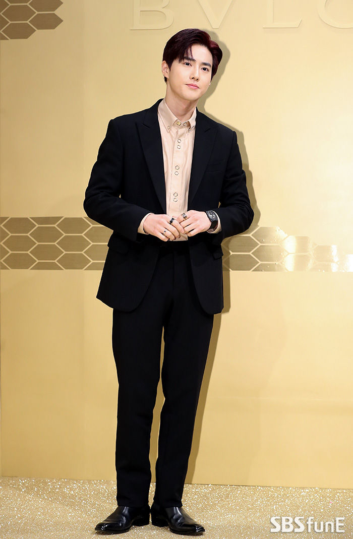 Suho of group EXO has a photo time at a fashion brand event held at Seoul Wave in Seoul Seocho District on the afternoon of the 29th.
