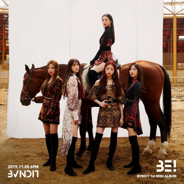 Group BVNDIT (Bandits) has released two new versions of its album, Official Photos.BVNDIT (Yiyeon, Song Hee, Jung Woo, Simyeong, Seung Eun) uploaded the first Mini album BE! first and second official photos through the official SNS account at 0:00 on the 28th and 29th.BE!, which was released in two versions over two days, attracts attention with its unique concept related to riding.In the first official photo released one day earlier, you can see the five members of BVNDIT (Bandits) that emit intense force with brown horses.In the individual cut, the charismatic eyes of the members stand out, and in the group cut, Yiyeon, who was on the horse, made a deep impression.The second official photo is more bright and bright in color.BVNDIT (Bandits) poses with their individuality in the outdoor riding area, and a picturesque group cut also gives the viewer a mysterious and exotic atmosphere.BVNDIT (Bandits) released two versions of its official photo, signaling a fresh concept that is different from others.It is noteworthy what kind of music and stage will be shown through the first Mini album BE!BVNDITs first mini album BE! will be released on November 5th at 6 pm on various online music sites.