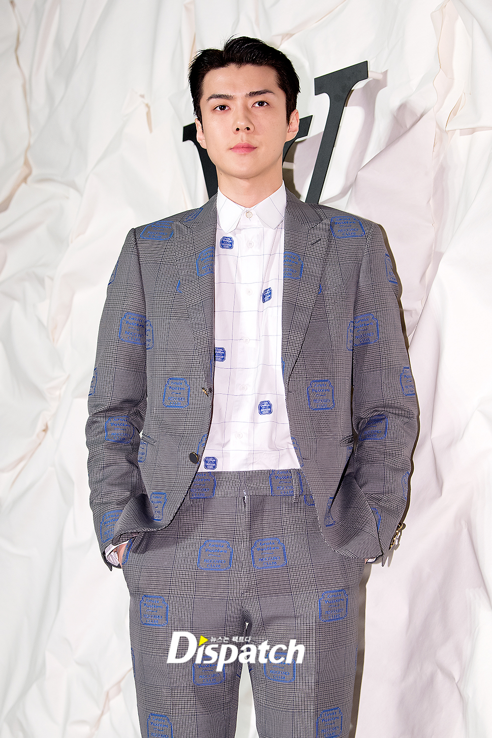 EXO Sehun attended a photo wall event held at a brand store in Cheongdam-dong, Gangnam-gu, Seoul on the afternoon of the 30th.EXO Sehun produced a chic fashion with a grey pattern suit on the day, capturing Sight with intense eyes.a straight-looking figureThis look, its intense.