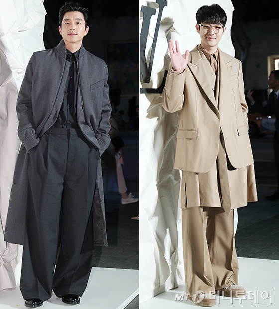 Men who wear suits every day are also troubled by the weather, whether they should look cold in a suit or what style to choose.If you want to produce an allautumn trendy style, lets refer to the fashion of stars.Actors Gong Yoo, Choi Woo-shik, Ha Jung-woo, Jung Woo-sung, Astro Cha Eun-woo, and EXO Sehun, who attended the opening event of Louis Vuitton Maison Seoul held in Cheongdam-dong, Gangnam-gu, Seoul on the 30th, turned into a colorful style of autumn man.I analyzed their fashion using unique design suits, The Classic Coat, and sensuous patterns.The three people were choices in calm and soft color suits such as beige, kite gray, and chacole, and gave a tummy atmosphere.Gong Yooo wore a dark grey shirt and wide pants, and produced a stylish look with a long coat.Choi Woo-shik and Cha Eun-woo completed their individual style by matching rugged sneakers to beige, grey-colored three-piece suits, respectively.In particular, Cha Eun-woo attracted attention with a strap jacket reminiscent of the clothes of Hanbok.Ha Jung-woo added points across a stylish pattern coat to the all-black look, which she paired with a neat round T-shirt, slim black pants and shoes.Jung Woo-sung completed a neat dandy look with a layered look layered with inners and the Classic Black Taylored Coat.Jung Woo-sung wore a white shirt and a gray knit with a sequin decoration, and completed the style with black pants and shoes.Sehun created a bright look by matching a white check shirt with a subtle pattern with a slim fit and a gray check suit with a blue pattern.Sehun accentuated her distinctive features with a perfectly bangs-up hairstyle.Louis Vuitton Maison Seoul Open Event  .. Unique suit and Coat fashion eyes