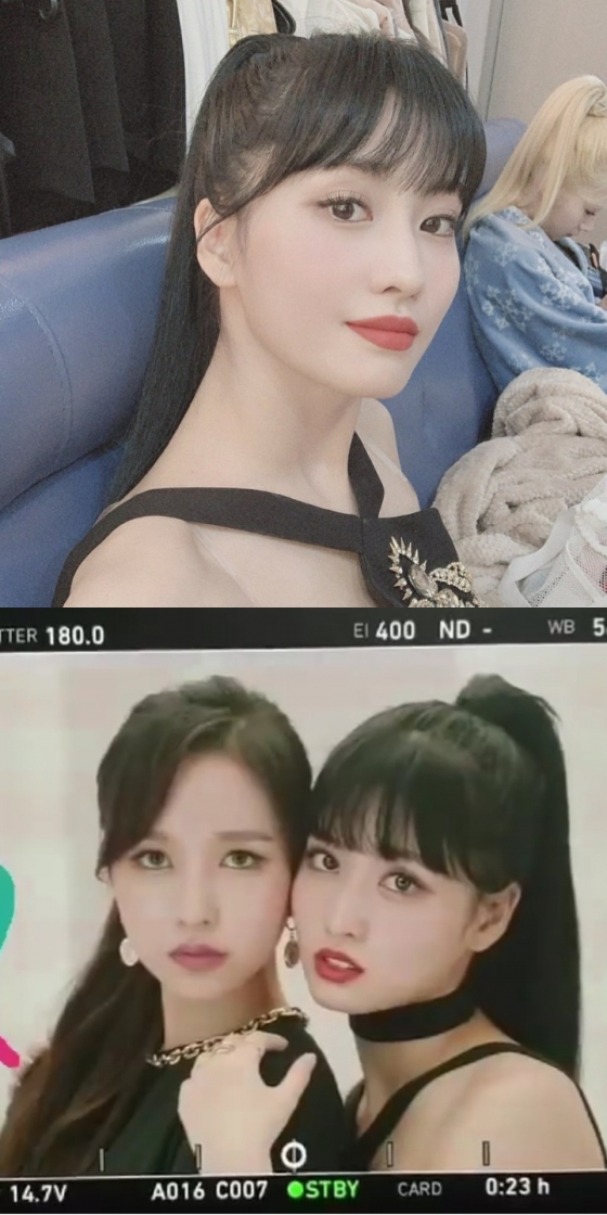 MOMO released selfie and music video behind-the-scenes photos on the 20th through TWICE official Instagram with the article # & TWICE came out a lot for me to listen to.MOMO in the public photo is staring at the camera with a ponytail hairstyle. MOMO showed off the allure while making a provocative look with TWICE member Mina.The fans enthusiastically cheered on the beauty of the MOMO goddess through comments such as It is pretty and beautiful, MOMO in charge of beauty.Meanwhile, TWICE will release its second album &TWICE in Japan today (on the 20th).