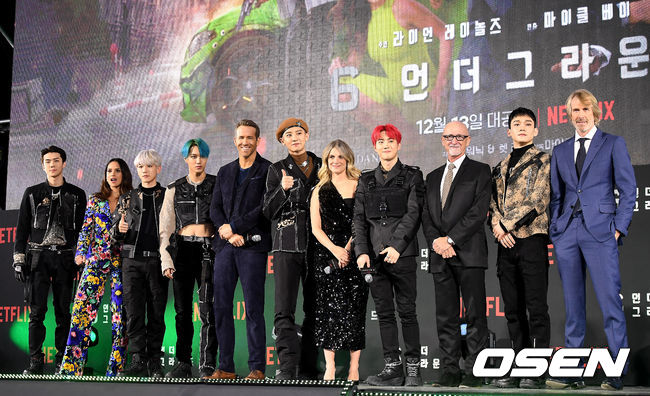 On the afternoon of the afternoon, the movie 6 Underground green carpet event was held at Dongdaemun Design Plaza in Jung-gu, Seoul.EXO Sehun, Actor Adria Arhona, EXO Baek Hyun, Kai, Actor Ryan Reynolds, EXO Chan Yeol, Actor Melanie Laurent, EXO Suho, Ian Bryce Producer, EXO Chen and Michael Bay have photo time.