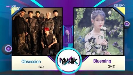 Group EXO beat IU to top spotEXO topped KBS 2TV Music Bank broadcast on December 6.The first week of December, EXOs Obsession and IUs Blueming were selected as Love Poem as a result of adding digital sound sources, audience preferences, number of broadcasts, and record scores.EXO, who won the first trophy, said, Thank you fans so much. I am sorry and always grateful for waiting. I will always be a hard-working EXO.I hope we will be happy together by the end of the year. Park Su-in