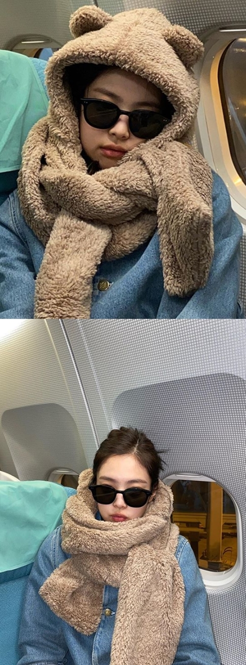 Jenny Kim, a member of the group BLACKPINK, showed off her cute charm.Jenny Kim released her photo on her Instagram account on the 9th day with an article entitled Baby its cold outside.In the photo, Jenny Kim, who has a bear-shaped shawl inside Planes, stares at the camera.Jenny Kim left for Beijing, China, via Incheon International Airport for the 9th day overseas schedule.