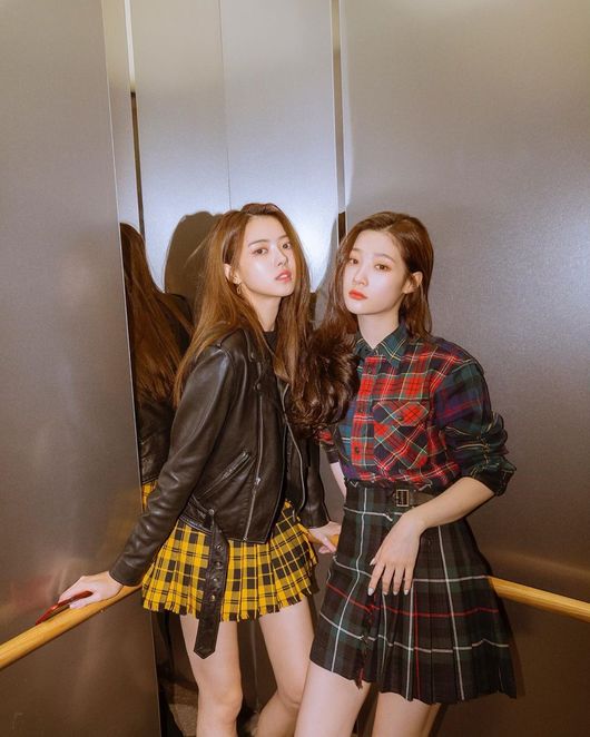 Lim Na-young and Jung Chae-yeon, who worked together as girl group I.O.I, met again.Lim Na-young posted an article and a photo on his instagram on the 12th, In the elevator.Inside the picture was a picture of Lim Na-young and Jung Chae-yeon posing in the elevator.Lim Na-young shows off the worlds most beautiful appearance in a yellow check pattern skirt and leather jacket, and Jung Chae-yeon wears a red check pattern top and skirt.Lim Na-young shows off a more tender vibe: Jung Chae-yeon still catches the eye with neat charm, vibe and visual.Lim Na-young and Jung Chae-yeon worked together as a girl group I.O.I through Mnet Produce 101 Season 1.Lim Na-young is currently working with the companys exclusive contract with Surbreed Agency, and Jung Chae-yeon is working as a girl group diamond.