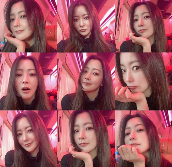 Actor Kim Hee-sun reveals AD sceneKim Hee-sun posted his selfie on his social media on Monday.Kim Hee-sun in the public photo boasted a mysterious ROWON atmosphere with long straight hair and black costume. Kim Hee-suns unique beauty catches the eye.Kim Hee-sun showed off her pale-colored charm with various facial expressions; her appearance during the ageless Kim Hee-sun also drew admiration.Kim Hee-sun will appear on SBSs new drama Alice scheduled to air next year.Kim Hee-sun plays the eccentric physicist Yoon Tae-yi, who holds the key to revealing the Secret of Journey to the Center of Time in Alice.She meets with a detective, Jin-gum, who claims to meet with her as a fateful reunion, and eventually solves the Secret of Journey to the Center of Time.In this process, he will gradually realize his hidden secret and lead the drama more exciting.