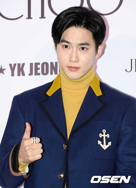 A British luxury accessory brand launch commemorative event was held at the dress garden of Seoul Gangnam District on the afternoon of 9th day.EXO Suho poses.