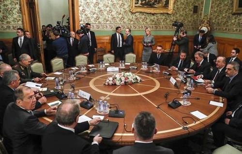 러시아 모스크바에서 13일(현지시간) 열린 리비아 휴전 협정 서명 협상 모습. [타스 연합뉴스]