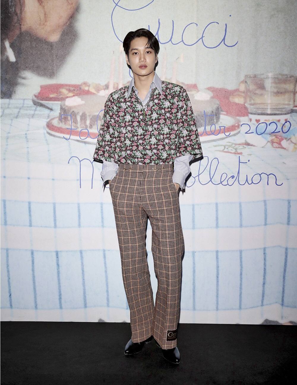 EXO Kai reveals the dignity of Global Fashion Icon at the Gucci Fashion showItalian luxury brand Gucci unveiled its 2020 Autumn/Winter Menz collection at the Palazzo Delle Scintille in Milan Pallazzo on the 14th (local time).The Korean representative was Kai, an ambassador for Gucci.Kai appeared at the show scene, which was phosphoricated with numerous fans, with a look that matched the Flower Printing Cotton Moslin shirt from the Gucci 2020 spring/summer collection with brown-beige vintage check pattern pants on vintage stripe shirts.Here, the silver necress with a Tiger head pendant of green enamel material, the Z and K initial ring, and the black leather brush booty of the interlocking G Holsbit detail.The picture of Kais fashion show preparation scene will be released on the official Instagram of GQ Korea on the 18th.