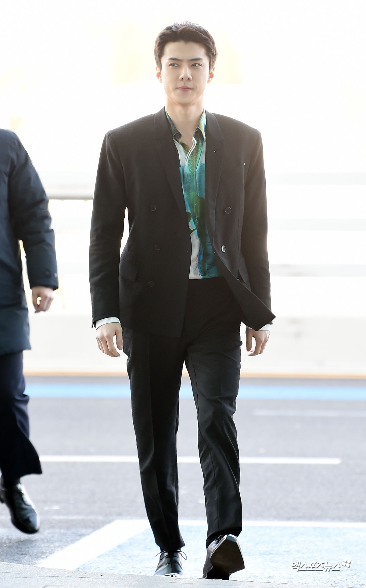 EXO Sehun is departing to Paris, France, through the Incheon International Airport on the afternoon of the 15th.