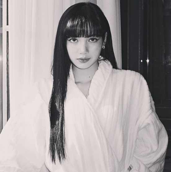 Group BLACKPINK Lisa has spewed out a unique aura.On Friday, Lisa posted a black and white photo on her Instagram, which showed Lisa staring at the camera in a shower gown.Lisas deadly eyes were on her. Lisa was long-haired and bangy-haired, and her glamorous visuals caught her eye.One picture alone gave a fascinating atmosphere. The fans who encountered the photos responded such as It is really cool, What pictures are like pictures and It is a big hit.Meanwhile, BLACKPINK, which Lisa belongs to, has recently successfully completed a tour of Japan.
