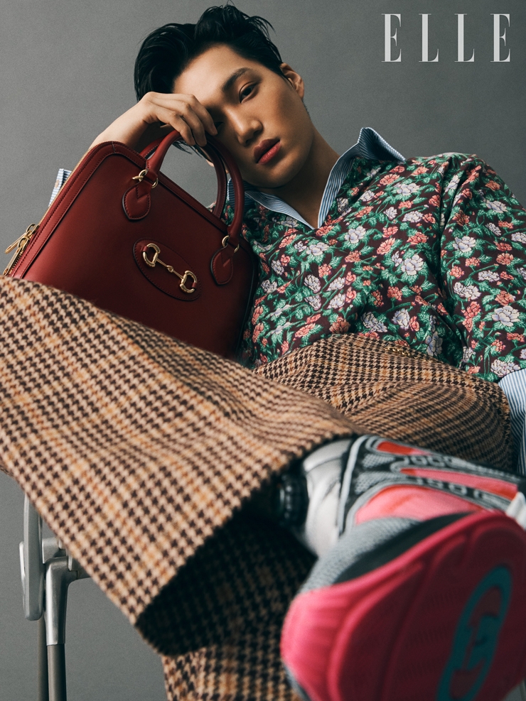 Italy brand Gucci has unveiled a fashion picture with Kai of the group EXO.Recently EXO Kai participated in a fashion pictorial with Gucci and Elle Korea, who posed in Guccis 2020 Spring Summer Collection.Kai in the picture layered a floral tower over a striped shirt.He completed a unique mix-match styling in brown pants with a houndtooth check pattern and ultra-face R sneakers.Red Handbags in one hand add neutral charmMeanwhile, Kai is working as a global campaign model for Gucci Eyewear, which will continue to carry on with Guccis activities as House Ambassador.
