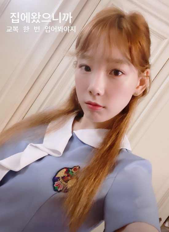Singer Taeyeon wore the uniform she wore during her school days again.On the 23rd, Taeyeon posted several photos on his instagram story with an article entitled I have to wear uniforms because I came home.The photo showed Taeyeon wearing a light blue-impressive lower-shoe and a dark navy jacket, and her eyes were focused on the lovely smile of Taeyeon.Taeyeon turned her hairstyle into a school day and showed her perfect uniform fit. It was a uniform worn about 10 years ago, but it still looked good.The fans who watched the photos responded I believe even if it is a real high school student, It looks really good, It is pretty.On the other hand, Taeyeon has recently been communicating with fans by revealing daily life on SNS.