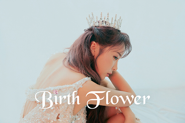 Singer Hong Jin-young has released a Teaser Image for her new album.Hong Jin-youngs new song Teaser Image was released through the official SNS of IMH Entertainment at noon on the 27th, and Hong Jin-young caught the attention with a red dress under red light and a flower in his hand.In particular, new song information was released along with intense Teaser Images.The new album Birth Flower (birth flower) heralded Hong Jin-youngs new start, and the new song Love is Like a Petal was opened, doubling curiosity about the song.In the Image released at 0 oclock on the same day, Hong Jin-youngs elegant and pathetic figure in a white dress reminiscent of a wedding dress attracted attention.The two contrasting Images of the day further raised the expectation of Hong Jin Youngs new album.On the other hand, Hong Jin-youngs new song Love is like a petal will be released at 6 pm on April 1.