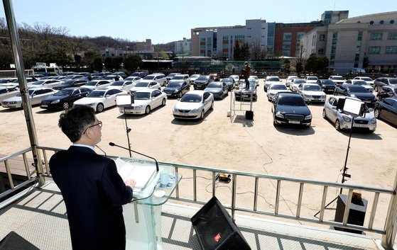 This Car Parking Worship is the one that we have been working on how to make sure that we can provide minimum number of people with the safety of the church and prevent the spread of coronavirus.Cho Hee-seo, a pastor of Seoul Citi Church in Jungnang-gu, Seoul, began a Sunday Worship sermon at 11 am on the 29th of last month.Pastor Cho was standing at the Songgok High School playground, not the church river, and the church members stopped at the playground and listened to the preaching that was frequencyd on the radio in the car and transmitted by radio.On this day, Worship was made in the form of Drive in, where the members were in the car.The Seoul Citi Church built an auditorium in Songgok High School and used it as a Worship Party, so it was able to use Songgok High School playground as Car Parking.This Drive in Worship is said to be the first case introduced in Korea.The members of the north, like the city of Uijeongbu, Gyonggi Province, please press the Claxon bread twice, the members welcomed each other with a horn.Some reached out of the middle window of Worship and shouted Hallelujah.The body is somewhere else, the mind is one placeThe weekend Worship landscape of some churches has changed in the aftermath of the new coronavirus infection (Corona 19) group infection.On the same day, the unusual appearance was also unfolded at Online World, which was held through YouTube by the Sanul Church in Gunpo, Gyonggi Province.The church, which could not be gathered in one place, gathered the praises in their respective spaces and united them together, allowing the body to feel like a chorus, although it is elsewhere.Lee Seung-han, a pastor of Sanul Church, said, I could not gather the praise team prepared for the special express in one place, so I worked on binding the images prepared at each place and made them into a chorus.Since then, a video has been released, which was composed of nine women and five men, and the song, Not Grace, prepared in advance by the churchs praise team, was sang in a comfortable place, and then edited together to sound like a chorus.Among the members, there was a reputation such as I was impressed and I was comforted when I could not easily gather.Some of them share their own business data in the Corona 19 crisis, where members can not gather together.Were going to release it for all families that are scattered and organized to prevent the spread of corona, said Sinkwise, an institute at the Education and Civil Service.We expect this situation to be a chance to make a phone call, Sinkwise said.Actor Lee Sung-kyung appeared in the online business video of Seoul Oryun Church on the 13th of last month.Lee Sung-kyung sang the song Wish, Hope and Pray at the 21 Day Video SEK Prayer for the Country and Nation released on YouTube at the time.The video, which features Lee Sung-kyung, has 990,000 views on Thursday afternoon.Actor Park Shin-hye promoted the same SEK prayer meeting and said, It is difficult to gather together with Corona 19 to work together, but I hope that we will keep basic preventive measures and overcome Corona 19 well while working in each position.Most churches will continue their Online Worldship on the 5th.We know that most of the churches will go to Online Worldship on the 5th to set up a high-intensity social distance, said a church official. The place where field work is given will be strictly followed by preventive measures.