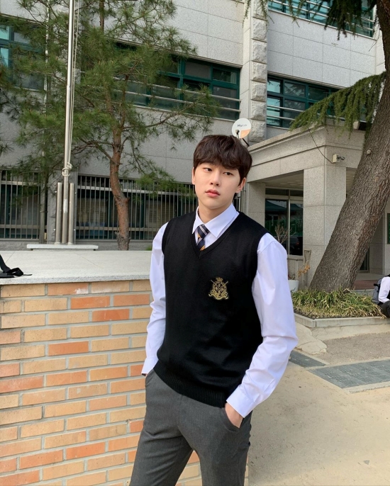 On the 11th, Kwon Hyun Bin posted a picture on his sns with an article called Chunggyo.In the photo, Kwon Hyun Bin poses in a school uniform; his extraordinary visuals have caught the attention of fans.Recently, Kwon Hyun Bin, Kim Na-hyun starring web drama Cafe Kilimanjaro started shooting.Cafe Kilimanjaro (playplayplay by Cho Yoon-kyung/director Kim Kwang-eun), a web drama co-produced by Min Contents and MCITY, tells the story that happens between the president of a sad novice cafe and the members of the band.They will show each other through various stories and show them a step further.Actor Kim Na-hyun, who plays the role of Tammi, the president of Cafe Kilimanjaro, a young child-dog zone in heaven and heaven, and Kwon Hyun Bin, a JBJ native of Sanha, the bands main vocalist, Leopards complete vocalist, Choi Si-hoon, a triple-mi, a triple-mi, a drummer, and a facial genius bassist, Triple Me Park Chan-gyu who plays Jae-young, and JxR Baekjin of absolute taste guitarist Chan.The cast members transformed each individual character into a member of cafe Kilimanjaro.Cafe Kilimanjaro, which conveys sweet comfort like a cup of coffee in a tired daily life, is currently being filmed and will be shown to the public this year.