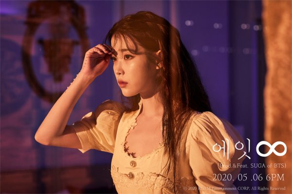 Singer IU has unveiled a new feel of Teaser Image ahead of its comeback on the 6th.EDAM Entertainment, an agency of IU, introduced the Teaser Image of its new song Eight on the 28th through the IU official SNS channel, and posted the second Teaser Image at midnight on the 30th to boost the comeback fever.In the open photo, IU in a faded dress reminiscent of the Middle Ages is staring out the window with tired and empty eyes as if waiting for a long time.In the first teaser image released earlier, the IU has released an additional mysterious and dreamy Teaser Image like a fairy tale, raising the expectation of the new song Eight to the highest level, showing the opposite appearance such as lighting, costume, nail tips, and so on.IUs new song Eight is known for collaboration with BTS Sugar, and foreign media such as Billboard in the United States as well as Korea are paying attention to their collaboration.There is a growing interest in what kind of musical charm the two people who have released various emotions and thoughts in a wide genre will show through this song.On the other hand, IUs new song Eight will be available on the music site before 6 pm on the 6th.