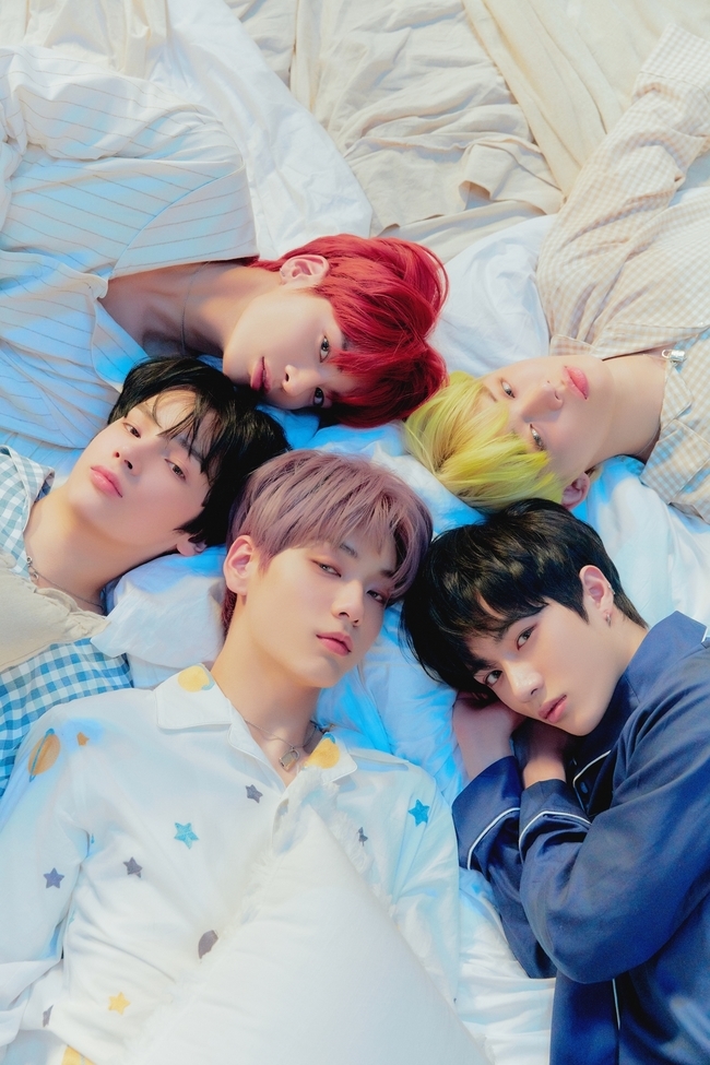 Group TOMORROW X Twogether has released a concept photo of the new album.TOMORROW X Twogether (Subin, Yeonjun, Bumgyu, Taehyun, and Humanning Kai) presented a starboard version concept photo of their second mini album Dream Chapter: ETERNITY on May 4 via the official home page and SNS channel.The released starboard version of the photo depicts boys who long for eternity.The members in the group photos stand side by side with each others hands in the background of the night sky, or lie face to face with their heads and stare at the camera with their faint eyes.You can also see pictures of five members who are dependent on each other in comfortable pajamas.The individual detailed cut of this concept photo, which was released in the form of SNS feed, can be confirmed through home page.Secret photos and videos are hidden throughout the group and member feed photos, so you can feel the fun of finding them.The five members showed off their five-color charm and brilliant visuals, perfecting two concepts, including the Port version that was introduced on the 1st and the Starboard version.With explosive reactions pouring in photos of conflicting atmospheres, attention is already drawn to what story will be contained in this album.minjee Lee