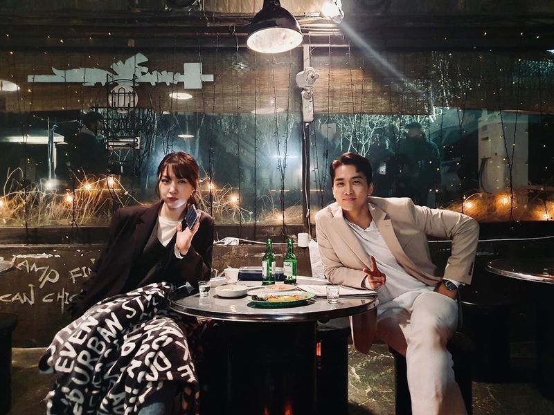 Song Seung-heon Seo Ji-hye two-shot was released.Actor Song Seung-heonn posted an article and a photo on his instagram on May 22nd, Would you like to have dinner on May 25th?The photo was taken by Song Seung-heon and Seo Ji-hye during the drama shooting, and the two are posing for the camera with a soju bottle and antler in front of them.The combination of handsome and beautiful actors who make them look good raises expectations for drama.minjee Lee