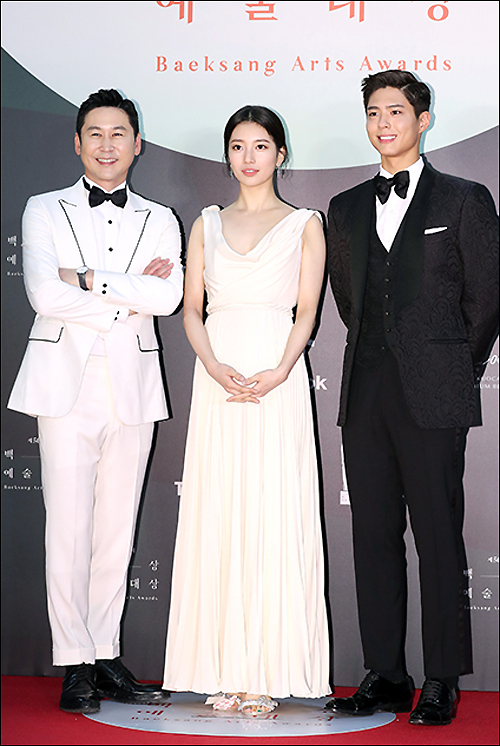 Shin Dong-yup, Bae Suzy and Park Bo-gum (from left) attend the red carpet event of the 56th Baeksang Arts Awards ceremony held at KINTEX, Ilsan, Goyang City, Gyeonggi Province, on the afternoon of the 5th.