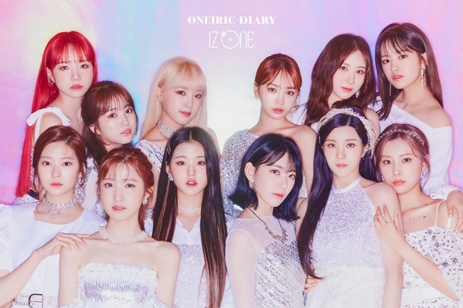 Group IZ*ONE (IZ*ONE) has released a new album, Official Photos.IZ*ONE released its third Oneiric version of the Mini album Oneiric Diary on official SNS from June 5th to 7th.Following the fresh and youthful Diary version, the Oneiric version of the individual and group official photo featured SinBrow and Elegance visuals from IZ*ONE members.The 12 members showed off their goddess force with a white & silver color dress look, and the delicate hologram background was added to it and completed a fantastic mood.On the 6th and 7th, another official photo of Oneiric Diary was released in succession.IZ*ONE, dressed in a mini dress of lavender, pink and sky-colored, captivated her eyes with a unique charm in front of a paper-made castle.pear hyo-ju