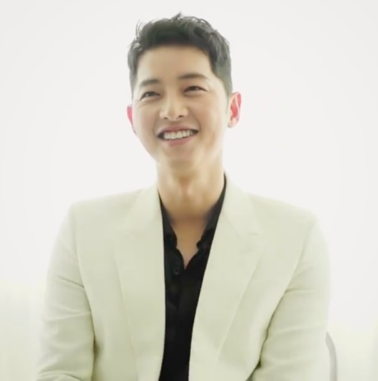 Actor Song Joong-ki flaunted his visuals during the warm-hearted.On the 15th, Song Joong-kis agency, High Story D & C Instagram, said, Hi_High Teaser # 2.Song Joong-ki SONGJOONKI and a short video was posted.Song Joong-ki in the public footage said, OK, Ill go again. Ill go again. After pretending to slate, he said, Im old.In particular, Song Joong-ki in the video showed a stylish aspect by matching a white jacket with a black shirt.Here Song Joong-ki smiles at the camera and boasts a handsome appearance and exudes admiration.Meanwhile, the movie Win Ri Ho starring Song Joong-ki is re-adjusting the release date with the aim of Chuseok.Song Joong-ki agency SNS