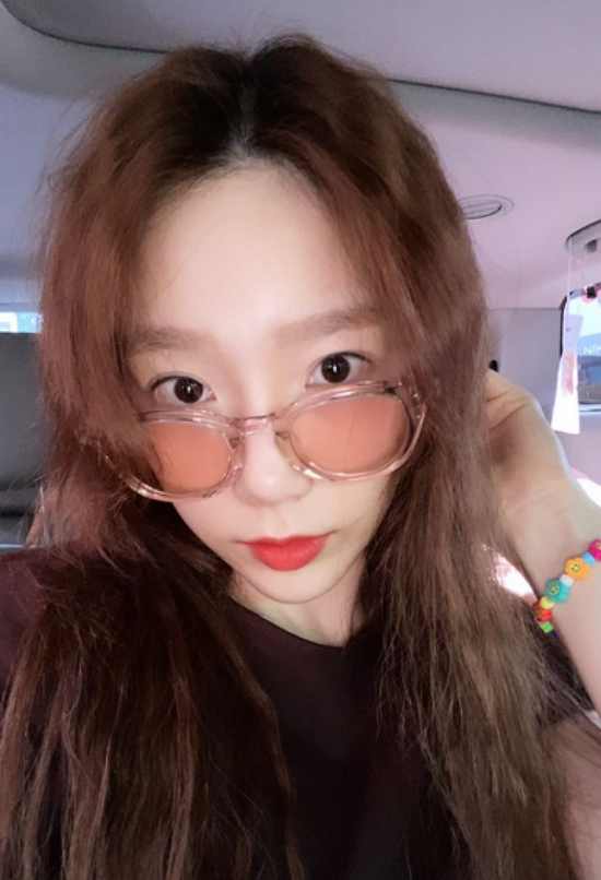 Singer Taeyeon captivated fans with her brilliant Beautiful looks.On the 15th, Taeyeon posted two daily photos on his Instagram   story, and the photo showed Taeyeon smiling at the camera in the car.Taeyeon wore pink sunglass and made a summer atmosphere. Even if her hair was blown, her beautiful Beautiful looks was outstanding.Taeyeon showed a heartbeat wink with a slight close to one eye. She made Beautiful looks with clear skin and clear features.The fans who responded to the photos responded such as Where are you going?, It is so beautiful, and I can even wear sunglass.On the other hand, Taeyeon shares his daily life with personal SNS and is communicating with fans.Photo: Taeyeon Instagram  