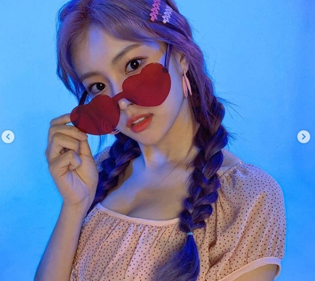 IZ*ONE Kang Hye-won flaunts Leeds Beautiful lookKang Hye-won posted several photos on June 19th with an article entitled See you later on the IZ*ONE official Instagram.Kang Hye-won in the photo is making a lovely look with heart-shaped sunglasses, doubling her mysterious charm with purple hair color.Especially with the comeback, Leeds Beautiful looks caused a heartbeat.The netizens who watched this responded such as It is really beautiful and Goddess Gwangbae.