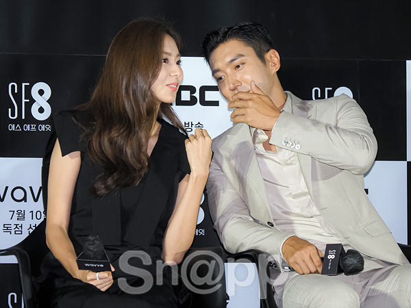Uee and Choi Siwon pose at the SF8 project production report held at Seoul CGV Yongsan Eye Park Mall on the afternoon of the 8th.