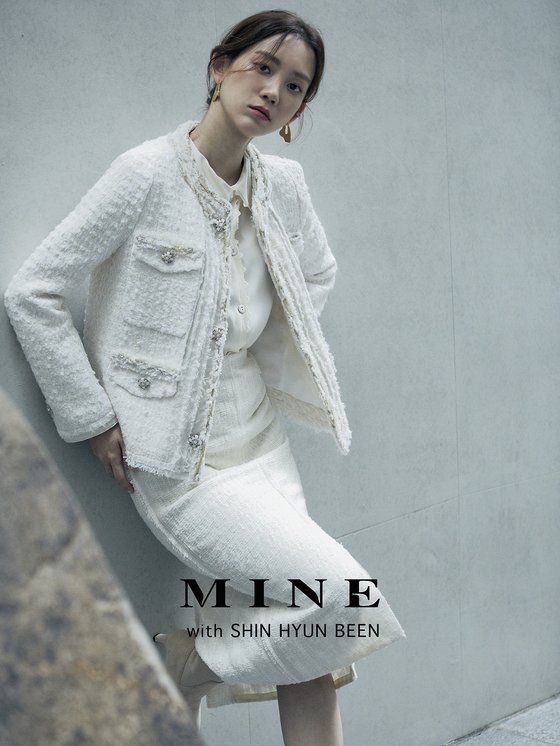  Actress Shin Hyun-bin has been chosen as the model for Brand MINE in a modern elegance motif based on an artistic sensibility.For the first time in the 2020 F/W Brand history, Mein has selected a model for the first time, and shin Hyun-bins artistic side and mines encounter with the artist who studied art capturea sense of more delicate and artistic sensibility.The 2020 F/W campaign aims to convey a message of empathy and healing to modern people who are tired of everyday life by focusing on their inner, visual, and tactile sensations under the theme of Your Mind, Your Sense.In the cross-coordination of traditional classic lines and casual items, Mein showcased some of the most versatile items in everyday life.  Tweed jackets, long pleated skirts, wool coats and other f/w season-leading items complete dazzling and sophisticated autumn looks.In the published photo, Shin Hyun-bin exudes a feminine elegance charm.  The modern design and artistic sensibility of Mine enhance the Elegance atmosphere of Shin Hyun-bin.Shin Hyun-bin is attracting attention for his eye-catching appearance in tvN drama The Wise Personal Life.Mines new 2020 F/W products can be found in stores nationwide and at Hansoms official online mall, Hansom.com.