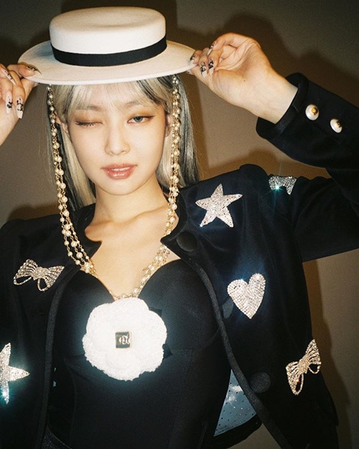 Girl group BLACKPINK member Jenny Kim (real name Kim and 24) released a photo for Halloween Day.Jenny Kim wrote Happy Halloween my beautiful creations on the Instagram on the 31st of Halloween.Its a picture of Jenny Kim holding a dainty white hat in a black jacket with a sparkling patch, including a star and heart, with a chic wink, closing one eye.In another photo, she stares straight at the camera and shows off her doll-like beautiful looks; netizens respond, such as I love you.BLACKPINK, which belongs to Jenny Kim, recently received Lovesick Girls worldwide love.