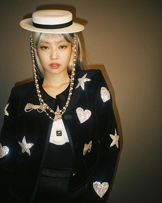 Girl group BLACKPINK member Jenny Kim (real name Kim and 24) released a photo for Halloween Day.Jenny Kim wrote Happy Halloween my beautiful creations on the Instagram on the 31st of Halloween.Its a picture of Jenny Kim holding a dainty white hat in a black jacket with a sparkling patch, including a star and heart, with a chic wink, closing one eye.In another photo, she stares straight at the camera and shows off her doll-like beautiful looks; netizens respond, such as I love you.BLACKPINK, which belongs to Jenny Kim, recently received Lovesick Girls worldwide love.