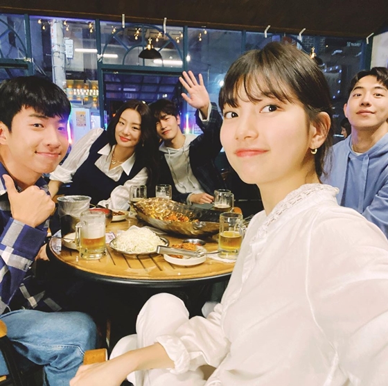 Actor Bae Suzy has revealed an Alcoholic drink with Nam Joo-hyuk, Yoo Soo-bin, Kim WAN and Stephanie Lee.Bae Suzy posted a picture and a picture on his instagram on the 7th, saying, Today is StartUp, Samsantec. Alcoholic drink day.In the public photos, Bae Suzy, Nam Joo-hyuk, Yoo Soo-bin, Kim WAN, and Stephanie Lee, who are appearing in the TVN Saturday drama StartUp, are creating a cheerful atmosphere.Bae Suzy is as dignified as Samsan Tech representative in the play.They are the elite members of Samsantec, a StartUp startup company in the play. They are struggling to show off their capabilities in the sandbox.Meanwhile, StartUp starring Bae Suzy, Nam Joo-hyuk and Kim Sun-ho is broadcast every Saturday and Sunday at 9 pm.