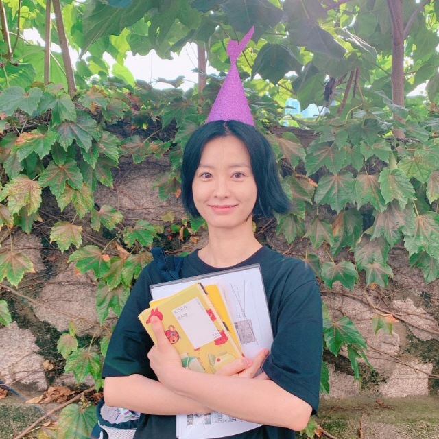 Actor Jung Yu-mi presented a refreshing Smile.Jung Yu-mi posted a picture on his 16th day of Monday on his instagram.Inside the picture is a daily picture of Jung Yu-mi. The appearance of wearing a cone hat is full of cuteness.Jung Yu-mi, who is building a clear Smile with a book called Health Teacher The School Nurse Files in a comfortable style.The beautiful beauty staring at the camera was admirable.Meanwhile, Jung Yu-mi recently appeared on Netflix The School Nurse Files.In addition, he won the Best Actress Award for the movie 82 year old Kim Ji-young at the 40th Youngpyeong Awards ceremony recently held.