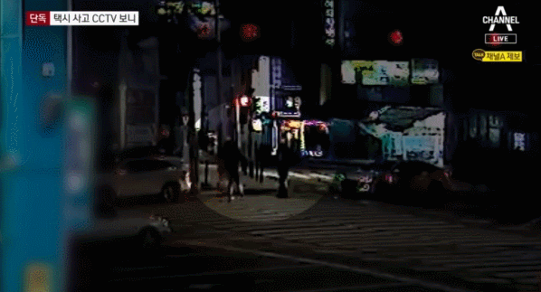 30대 남성과 택시기사가 각자 차량에서 내려 대화하고 있다. 채널A