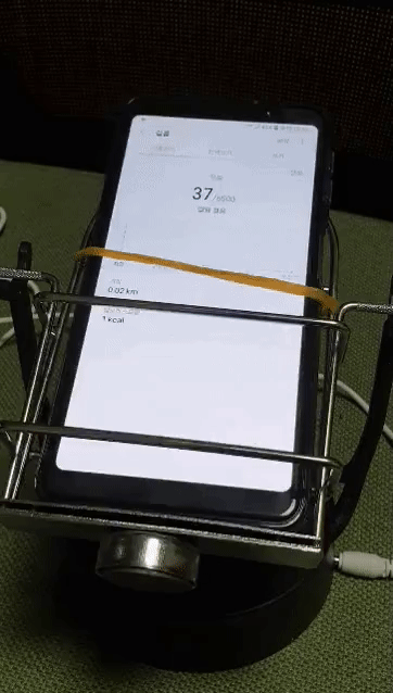 휴대폰을 흔들어 걸음 수를 올려주는 '걷기 기계' [인터넷 캡처]