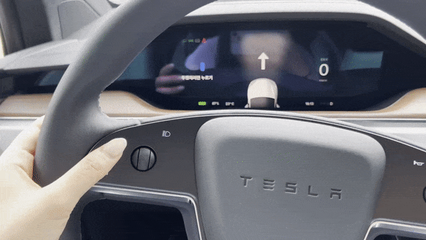 As for the lack of stalks, tap the buttons on the steering wheel to make turn signals. [SARAH CHEA]