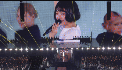 K-팝(POP) 걸그룹 뉴진스의 멤버 하니(20)가 지난달 26~27일 일본 도쿄돔에서 열린 팬미팅 ‘버니즈 캠프 2024 도쿄돔’에서 1980년 일본 가수 마쓰다 세이코(松田聖子)가 불렀던 ‘푸른 산호초(靑い珊瑚礁)’를 부르고 있다. [유튜브 'Karl Wong' 채널 캡처]