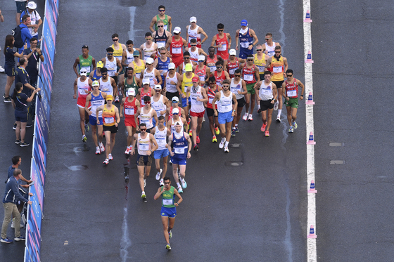 Korean race walker Choe gets lapped but notches fastest time at third ...