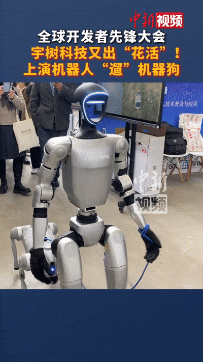 중국 상하이에서 열린 GDC에서 로봇개를 산책시키는 휴머노이드로봇/사진=중신비디오