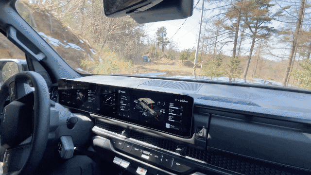 Kia's Tasman pickup trucks undergo off-road test drives on Monday in Inje, Gangwon Province. The trucks utilize diverse driving modes that optimize performance on various types of terrain. (Lim Jae-seong / The Korea Herald)