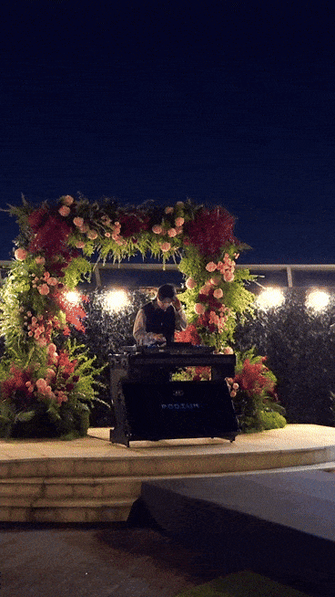 A DJ keeps the dance floor alive as guests mingle and dance. (Song Seung-hyun/The Korea Herald)