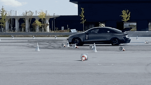 The Ioniq 6 N drifts during a demonstration run at a media test drive event in Taean, South Chungcheong Province, Thursday. (Lim Jae-seong / The Korea Herald)